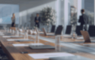 blurred well-lit modern boardroom