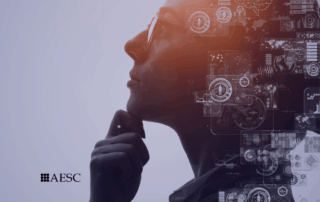 corporate woman pondering with her hand below her chin