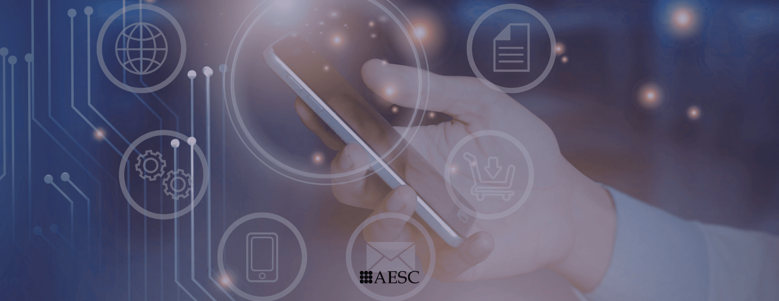 Hand holding a cell phone with graphics overlayed showcasing work